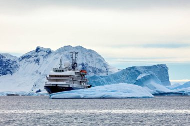 Cruising Ship in the Antarctic Area  clipart