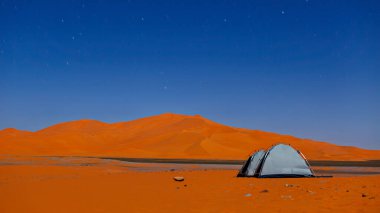 Camping in the Sand Dunes in the Sahara of Algeria clipart