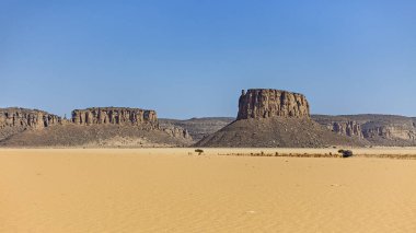 The mountain Landscape of the Sahara Desert in Algeria clipart