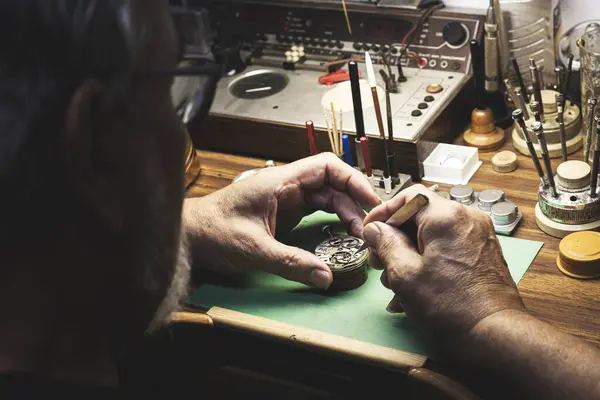 Shot Watchmaker His Workbench Full Tools His Expert Hands Seen — Stock Photo, Image