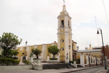 old church with the white sky in the city of Colima