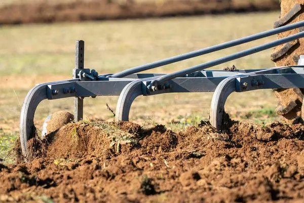 Antalya 'da tarlasını süren bir çiftçi