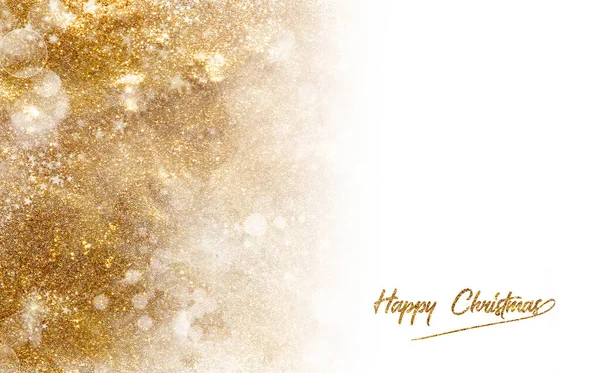 Golden Christmas background with sparkling and twinkling bokeh from party lights and golden glitter, over white with copyspace for your seasonal greetings