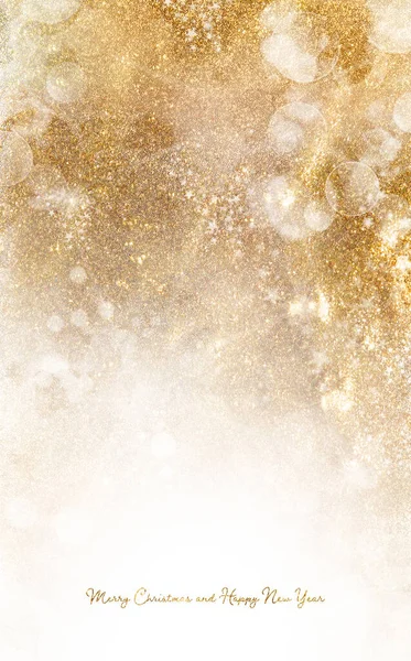 Golden Christmas background with sparkling and twinkling bokeh from party lights and golden glitter. Vertical format with copyspace for your seasonal greetings