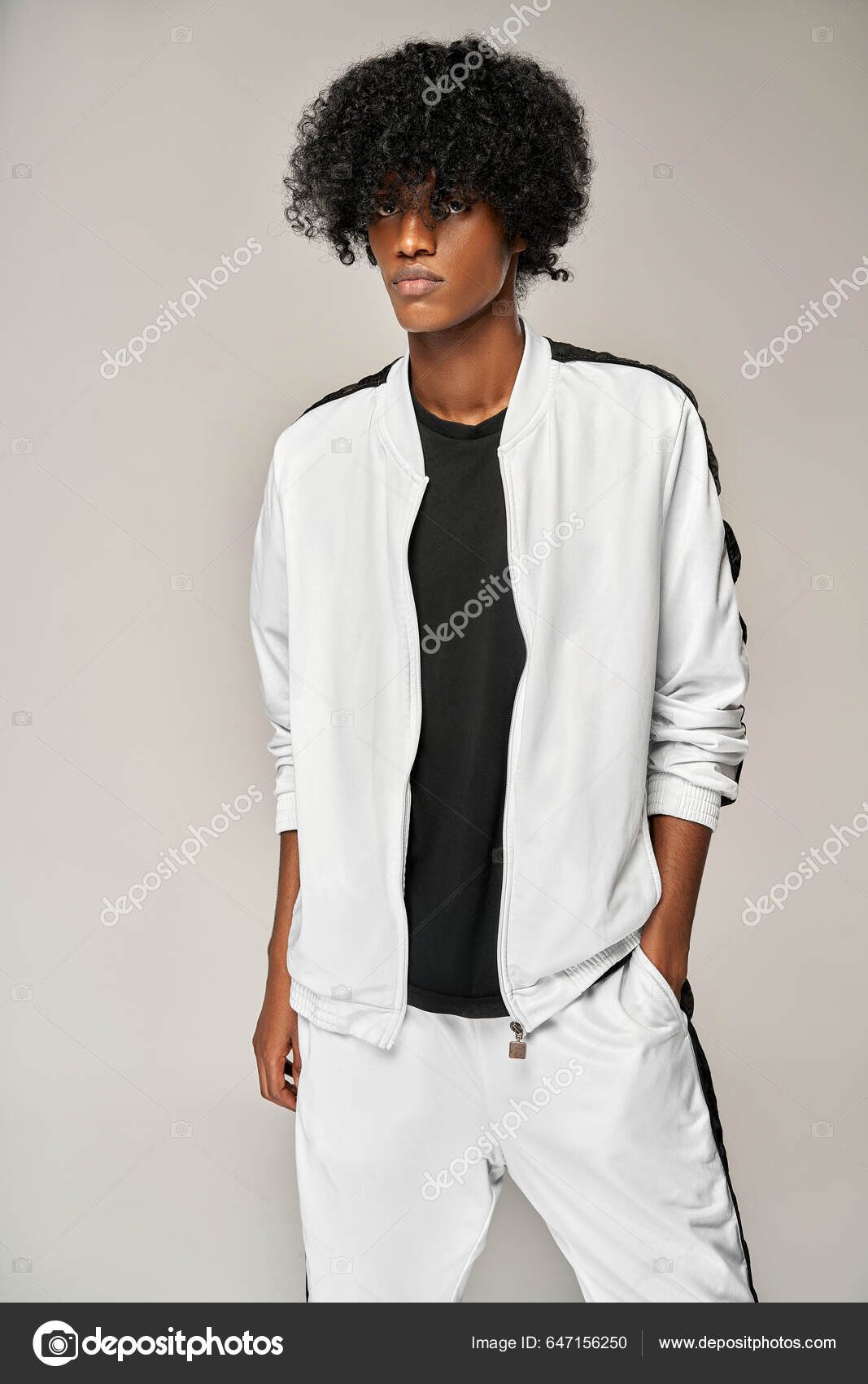 Man in white clothes Stock Photo by ©kiuikson 169220294