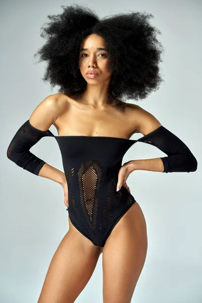 Beautiful African American Girl Afro Hairstyle Wear Black Bodysuit Stock Photo