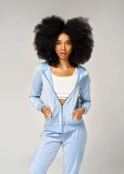 Beautiful African American Girl Afro Hairstyle Wear Blue Velour Tracksuit Stock Picture