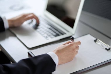 Business person doing research on a computer