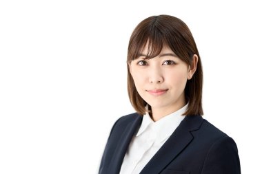 Asian business woman standing with a smile