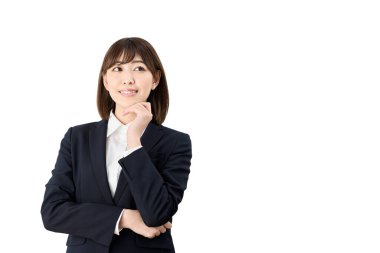 Asian business woman thinking of good things