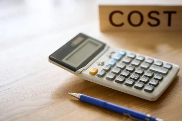 stock image Image of a calculator for calculating costs