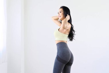 Portrait of a woman with an image of butt lift