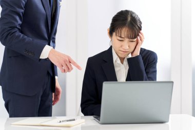 Business woman being blamed for problems at work clipart