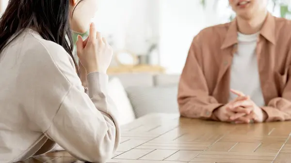 Stock image Couple having a serious conversation in the living room