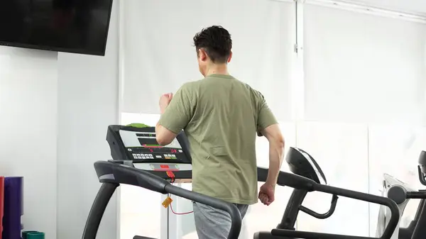 stock image Man training on a treadmill