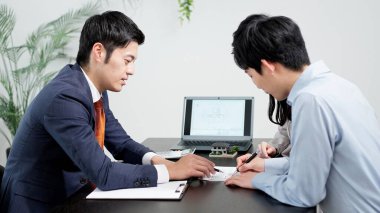 Man signing a real estate contract clipart