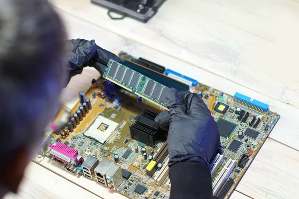 Inserting Ram Motherboard Computer Table Gray Background — Stock Photo, Image