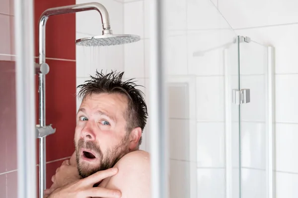 European Man Takes Shower Lukewarm Water Freezes Looks Miserable Concept — Stock Photo, Image