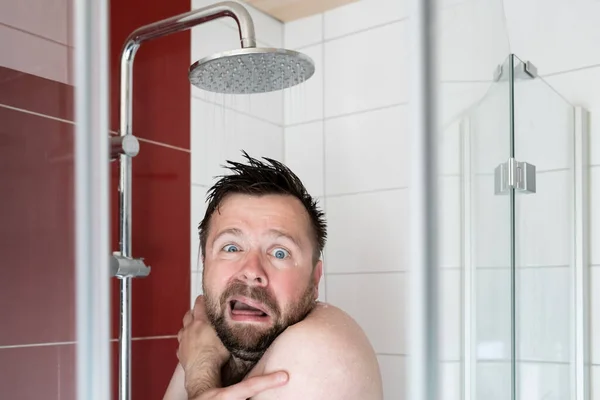 European Man Takes Shower Cold Water Freezes Looks Miserable Concept Royalty Free Stock Images
