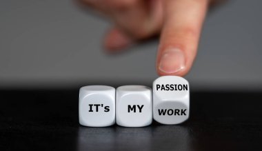 Hand turns dice and changes the expression 'it's my work' to 'it's my passion'. clipart