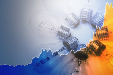 Dünyadaki enerji krizi sırasında mevcut yüksek elektrik fiyatını temsil eden ampuller ve yükselen Sparkline grafiği