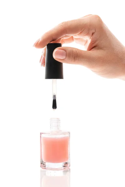 Zbliżenie Żeński Ręka Piękny Francuski Manicure Gospodarstwa Butelka Różowy Paznokci — Zdjęcie stockowe
