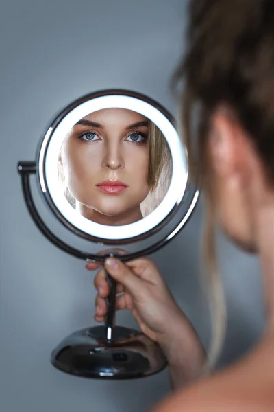 Beautiful Woman Looking Mirror Gray Background — Stock Photo, Image