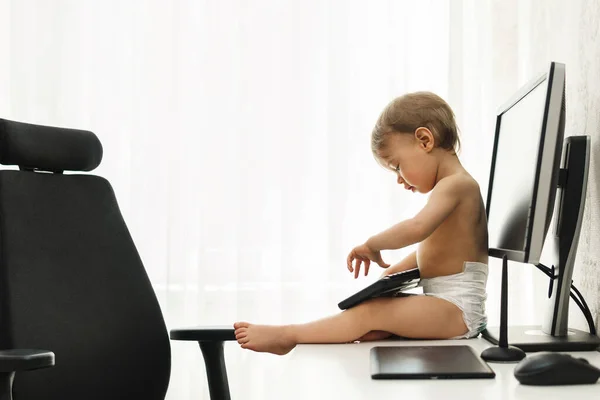 Little Boy Sitting Desk Playing Wireless Keyboard Home Office Workplace — Stock Photo, Image