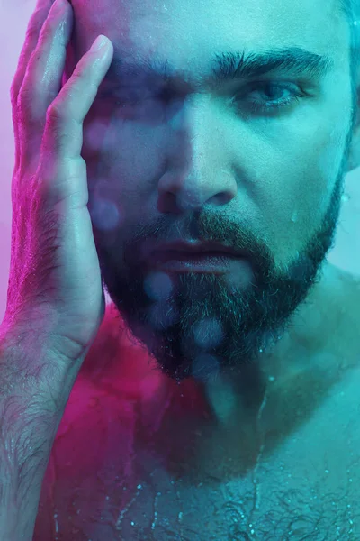 Portrait Handsome Young Man Captured Wet Glass Colorful Neon Light — Stock Photo, Image