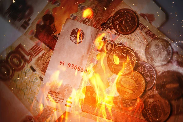 stock image Background of burning russian rubles in fire flames