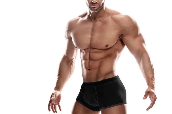 Muskulös Man Bodybuilder Bär Svarta Underkläder Poserar Mot Vit Bakgrund — Stockfoto