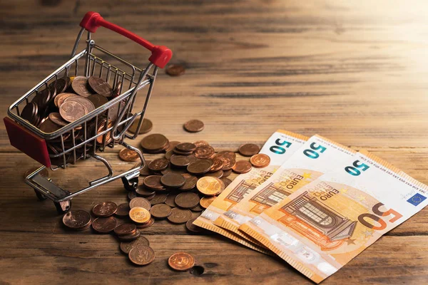 Closeup Shot Fifty Euro Banknotes Tiny Shopping Cart Filled Small — Stock Photo, Image
