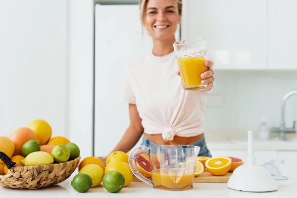 Young Cheerful Woman Big Glass Fresh Orange Juice Home Focus — Stock Photo, Image