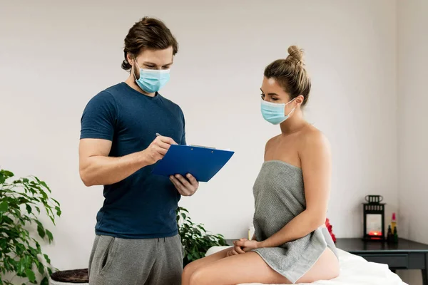 Man Manual Therapist Wearing Prevention Mask Working Woman Client Massage — Stock Photo, Image
