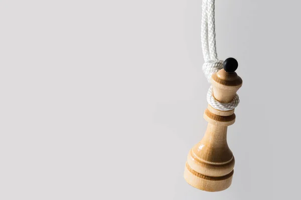 Closeup Shot Wooden Chess Queen Hangs White Rope Concept Facing — Stock Photo, Image
