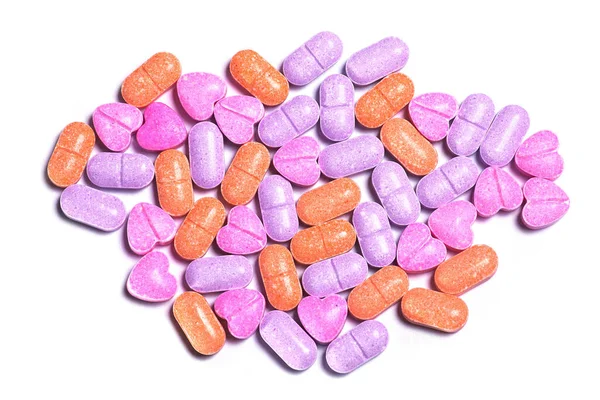 Closeup Tiro Uma Pilha Pílulas Vitaminas Coloridas Fundo Branco — Fotografia de Stock