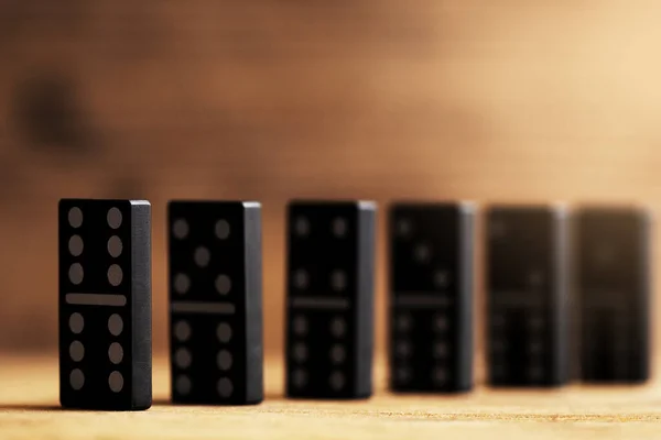 Closeup Shot Chain Black Plastic Domino Tiles White Symbols Standing — Stock Photo, Image