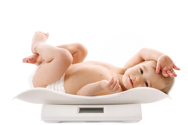 Weight Measuring Adorable Little Boy Diaper Lying Scales White Background — Stock Photo, Image