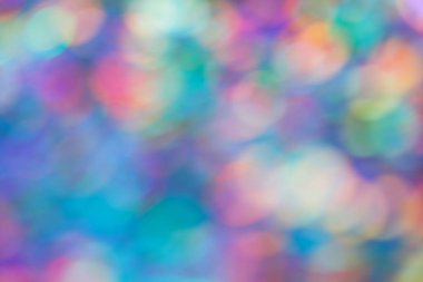 Bulanık çok renkli ışık noktalarının soyut bokeh arkaplanı.