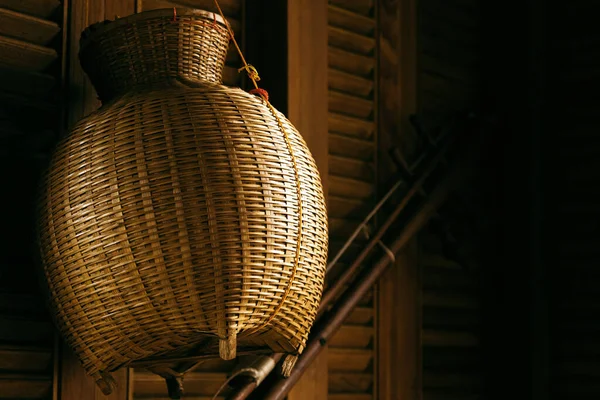 Closeup Shot Straw Wicker Basket Hanging Wooden Wall Cozy Rural — Stock Photo, Image