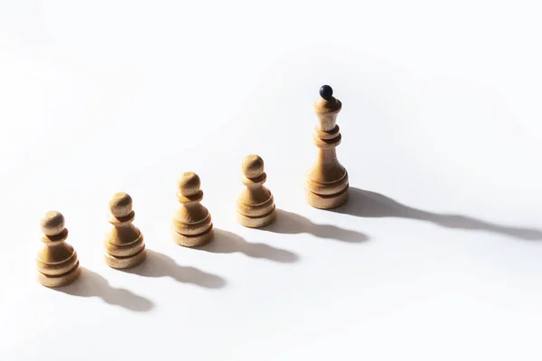 Row Wooden Chessmen Queen Lead — Stock Photo, Image