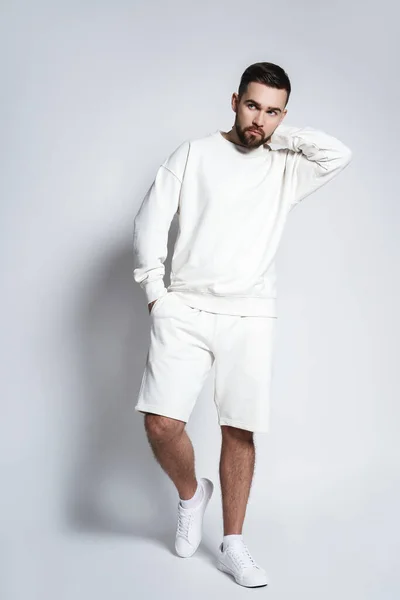 Handsome Man Wearing White Sweatshirt Shorts Gray Background — Stock Photo, Image