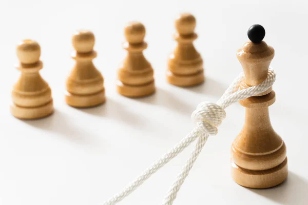 Closeup Shot White Rope Tangled Wooden Queen Several Chessmen Nearby — Stock Photo, Image