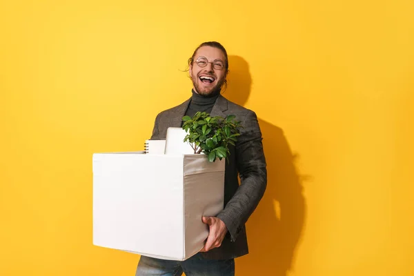 Young Happy Man Holding Box Personal Items Job Promotion Yellow — Stock Photo, Image