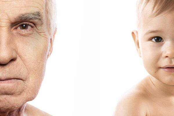 Portrait of elderly man and baby boy. Concept of rebirth and cycle of life.