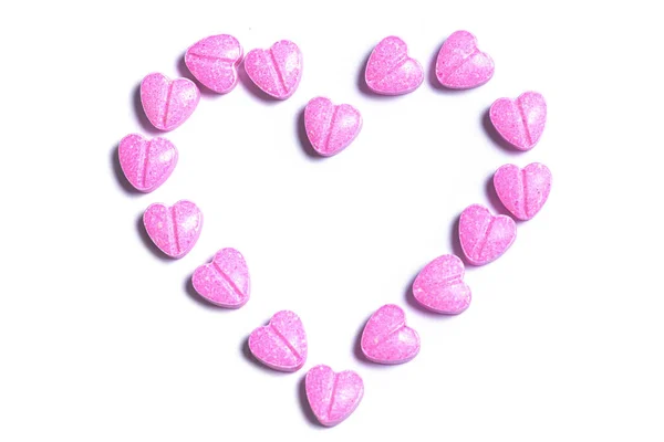 Closeup Shot Heart Symbol Made Pink Heart Shaped Pills White — Stock Photo, Image