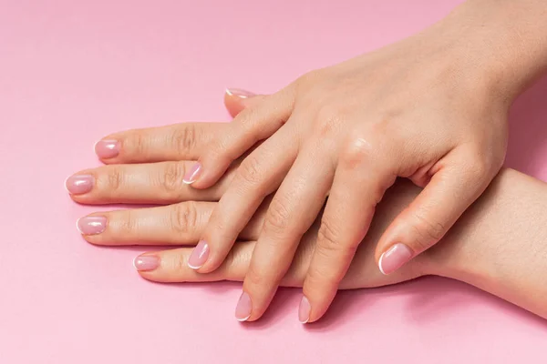 Closeup Female Hands Soft Skin Beautiful French Manicure Pink Background — Stock Photo, Image