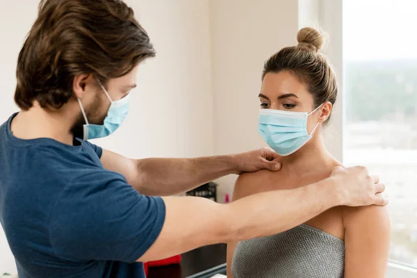 Man Manual Therapist Wearing Prevention Mask Working Woman Client Massage — Stock Photo, Image