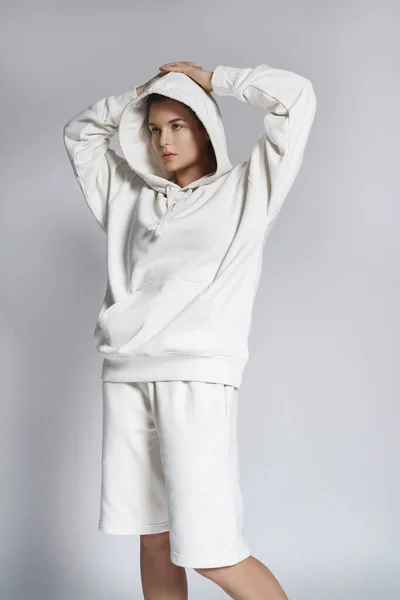 Young Woman Stylish Woman Wearing White Hoodie Gray Background — Stock Photo, Image