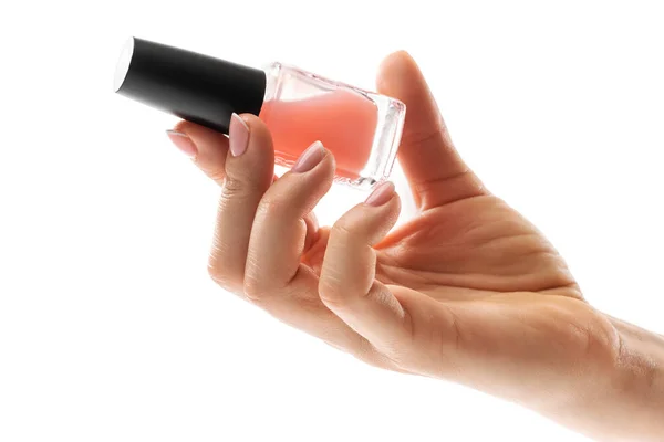 Zbliżenie Żeński Ręka Piękny Francuski Manicure Gospodarstwa Butelka Różowy Paznokci — Zdjęcie stockowe